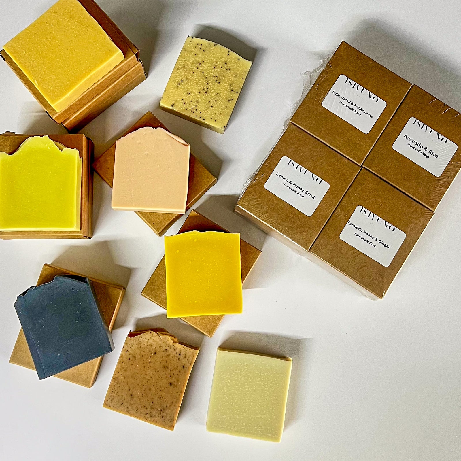 Handmade cold process soap variety pack featuring artisan soaps in recyclable kraft packaging.
